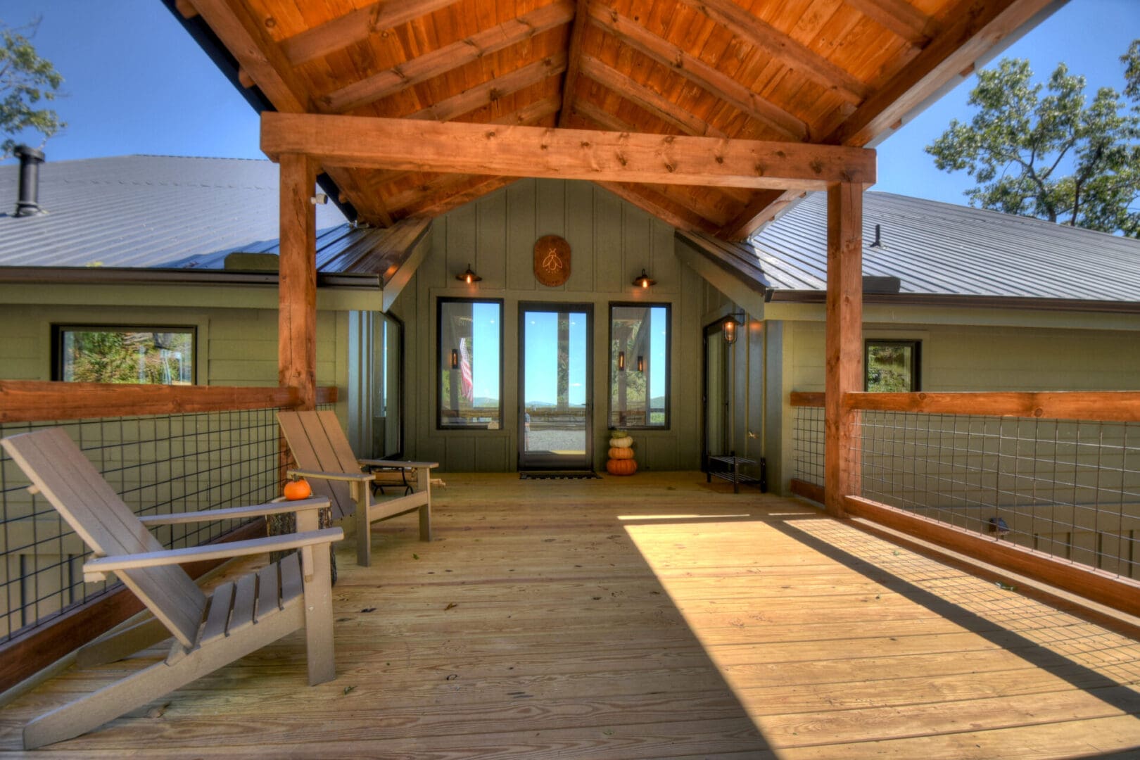 Architectural Design services for a porch of a cabin with a wooden deck.